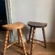 Pair of wooden milkman's stools turned brutalist