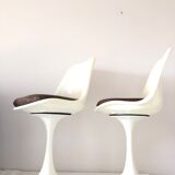 Pair of vintage tulip foot swivel chairs
