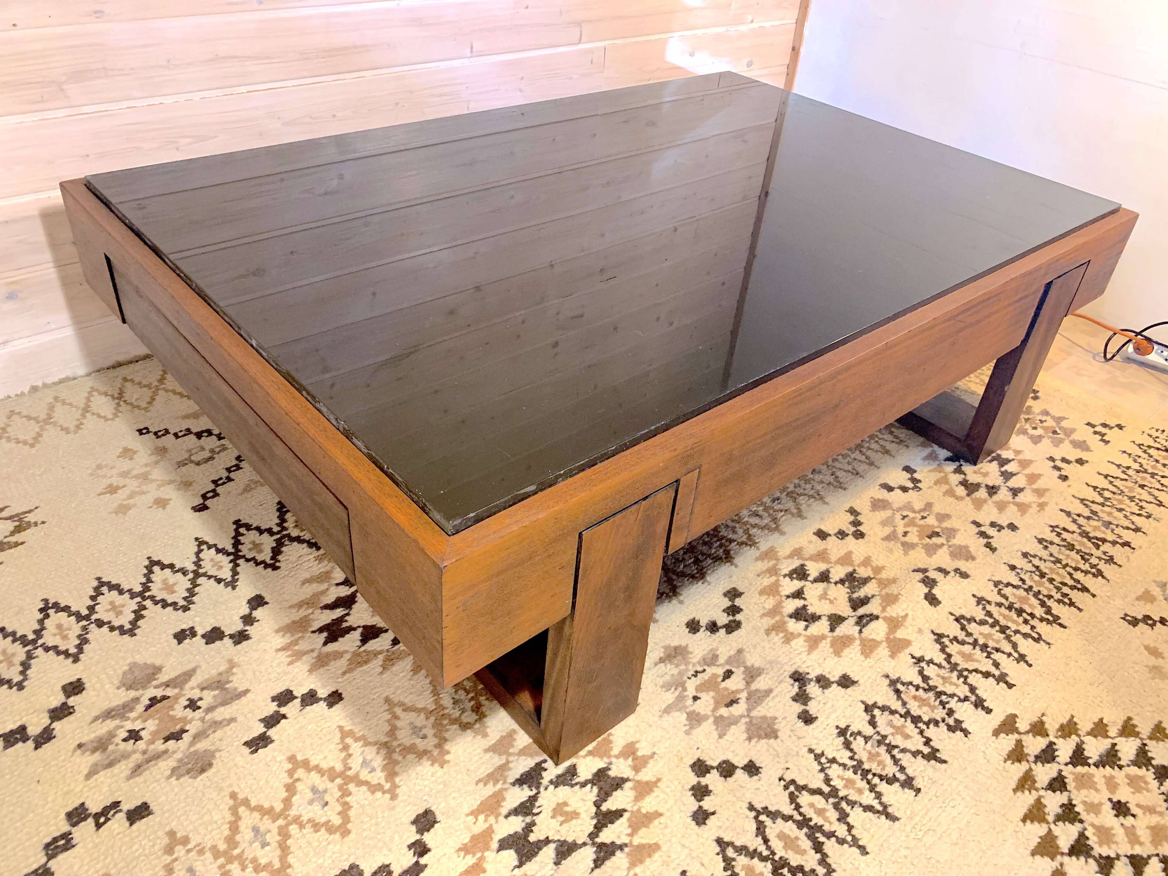 Rosewood coffee table, with black glass top, Brazil 1970