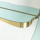 Two-tone glass and gilded brass console mirror. Circa 1950.