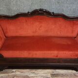 Sleeper or bench from the Charles X period in richly carved mahogany.