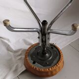 Vintage rotating stool seated in leather and chrome legs