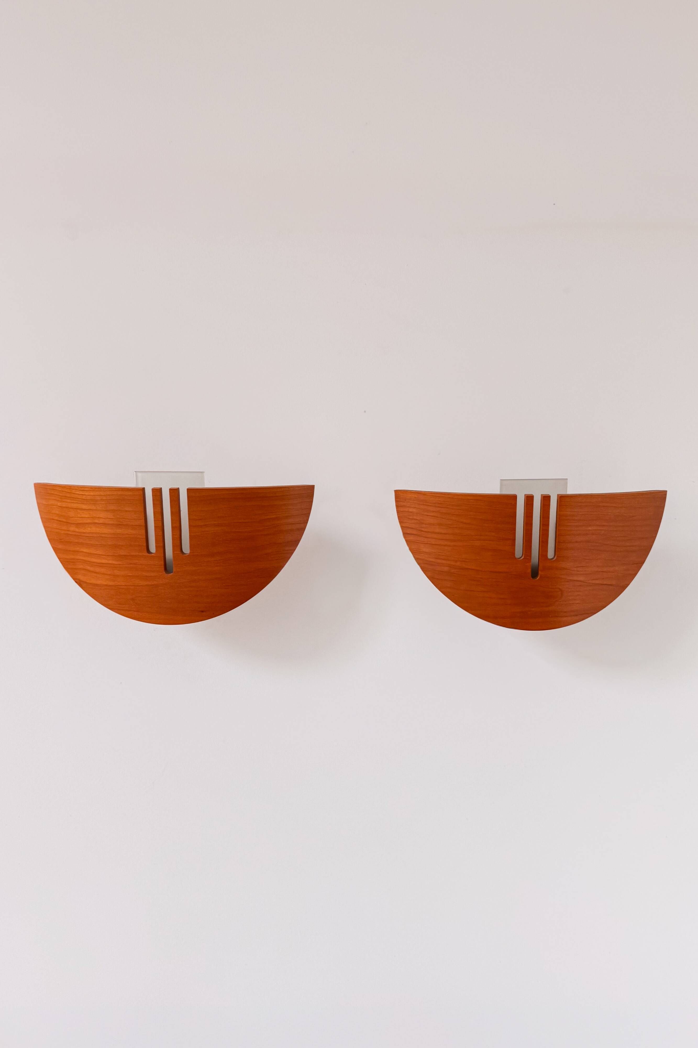 Pair of vintage wall lights in wood and glass, France 1970.