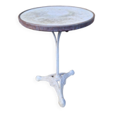 Early 20th century Parisian bistro pedestal table in marble and cast iron