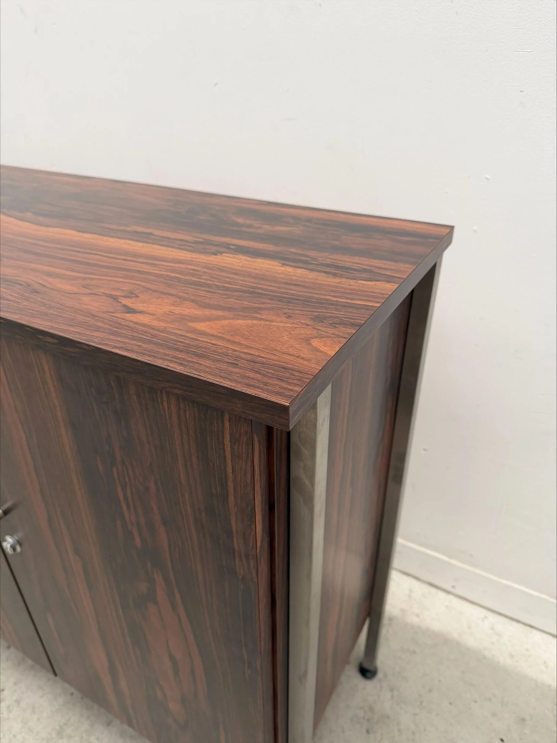 Enfilade in formica imitation rosewood with a chrome base, 1970.