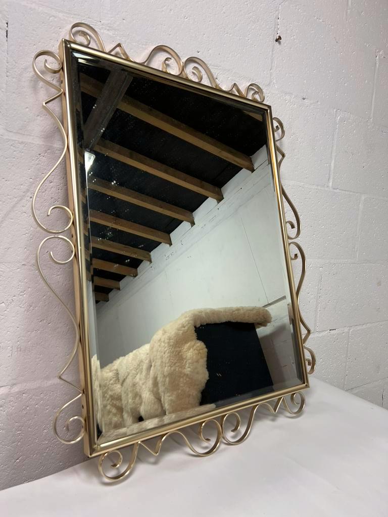 Miroir en or vintage avec cadre orné