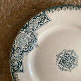 3 mismatched iron earth flat plates in green.