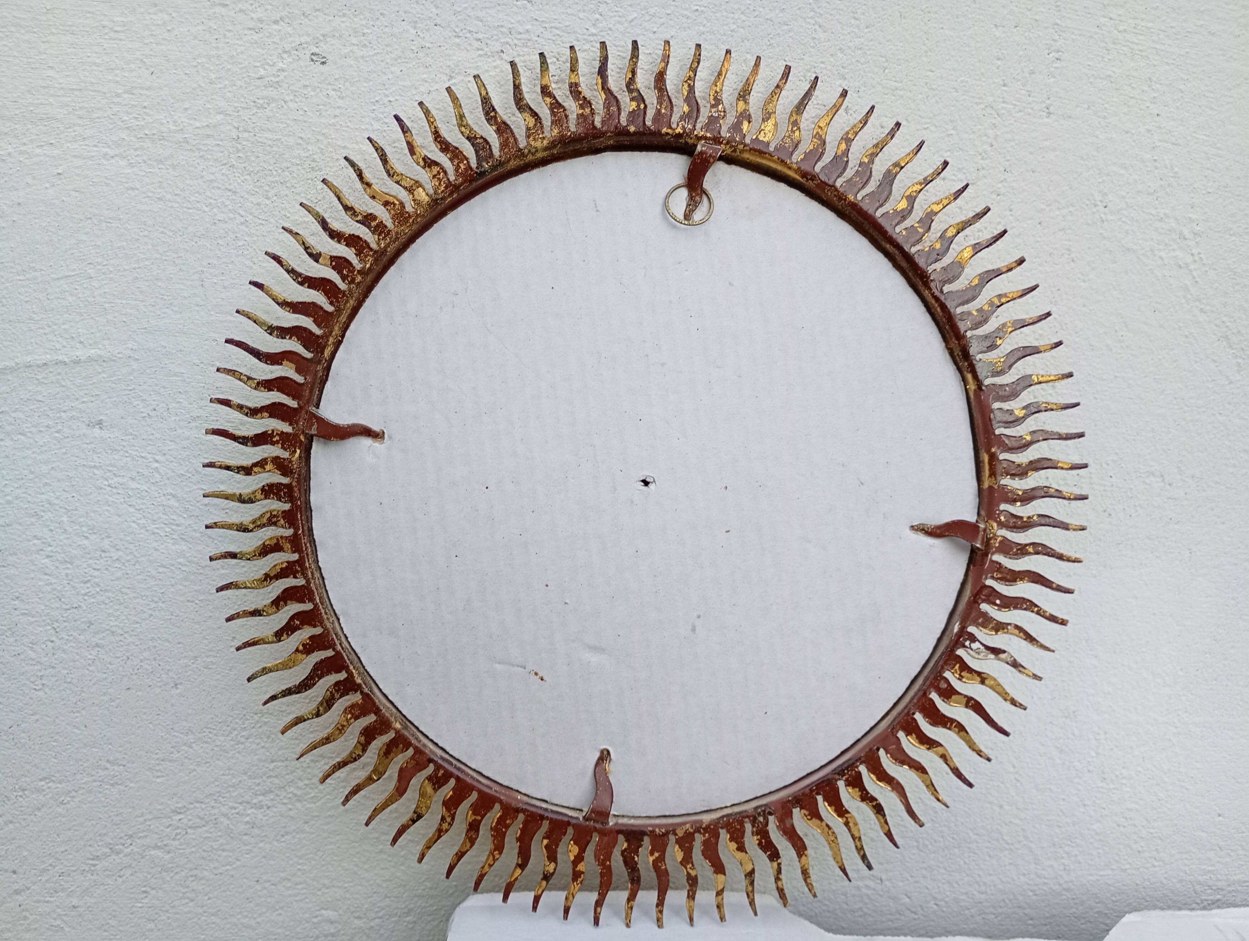 Miroir soleil vintage doré en métal – style années 60/70