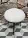 New metal tripod stool with boucle seat.