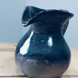 Pitcher in varnished sandstone