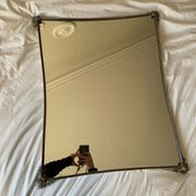 Miroir en metal argenté bord incurvé