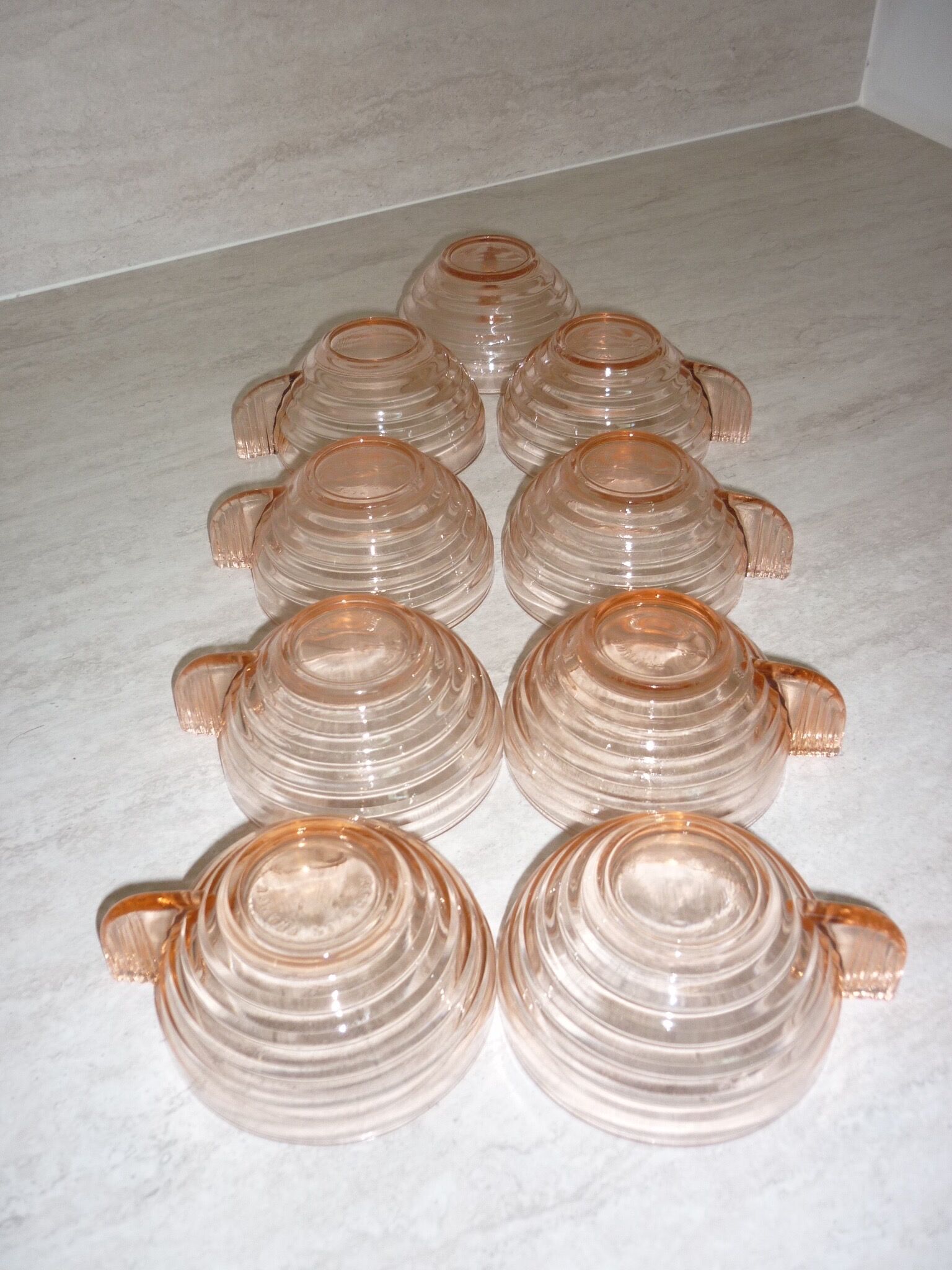 Lot 9 art deco cups in pink transparent glass
