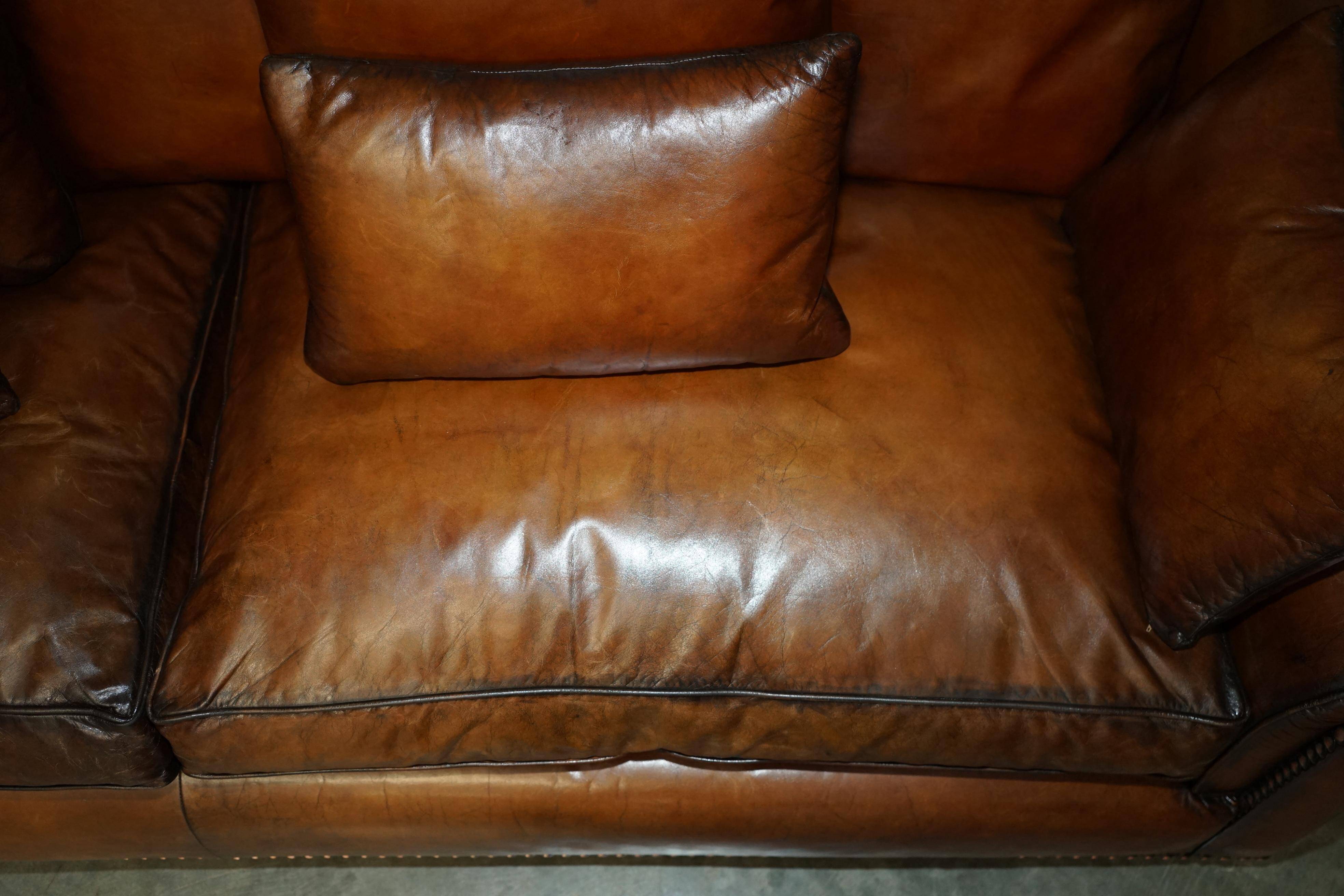 Pair of Ralph Lauren Jamaica club sofas restored in leather.