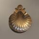 Shell-shaped brass catchall