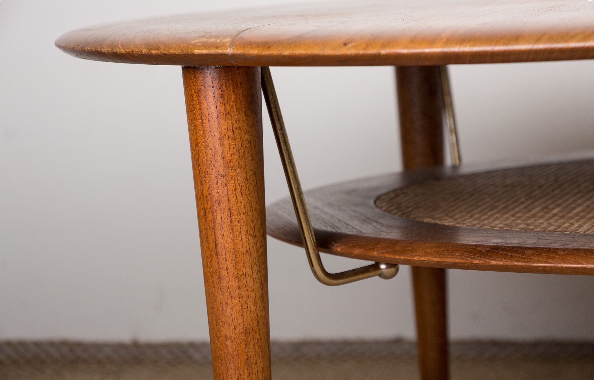 Round coffee table, two levels, danish in teak, brass and cannage