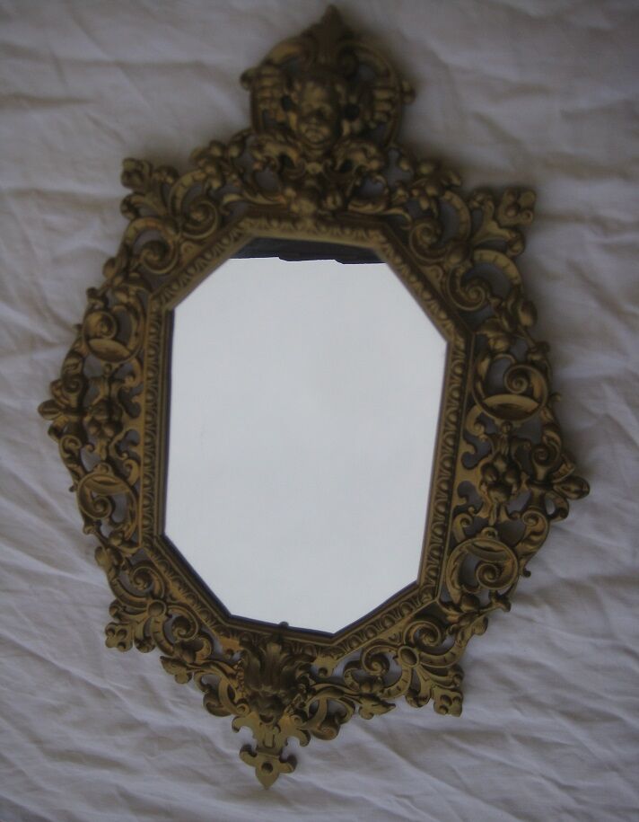 19th century bronze mirror with ancient angelot 33x46cm