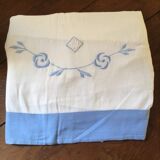 Embroidered cotton linen sheet with blue border