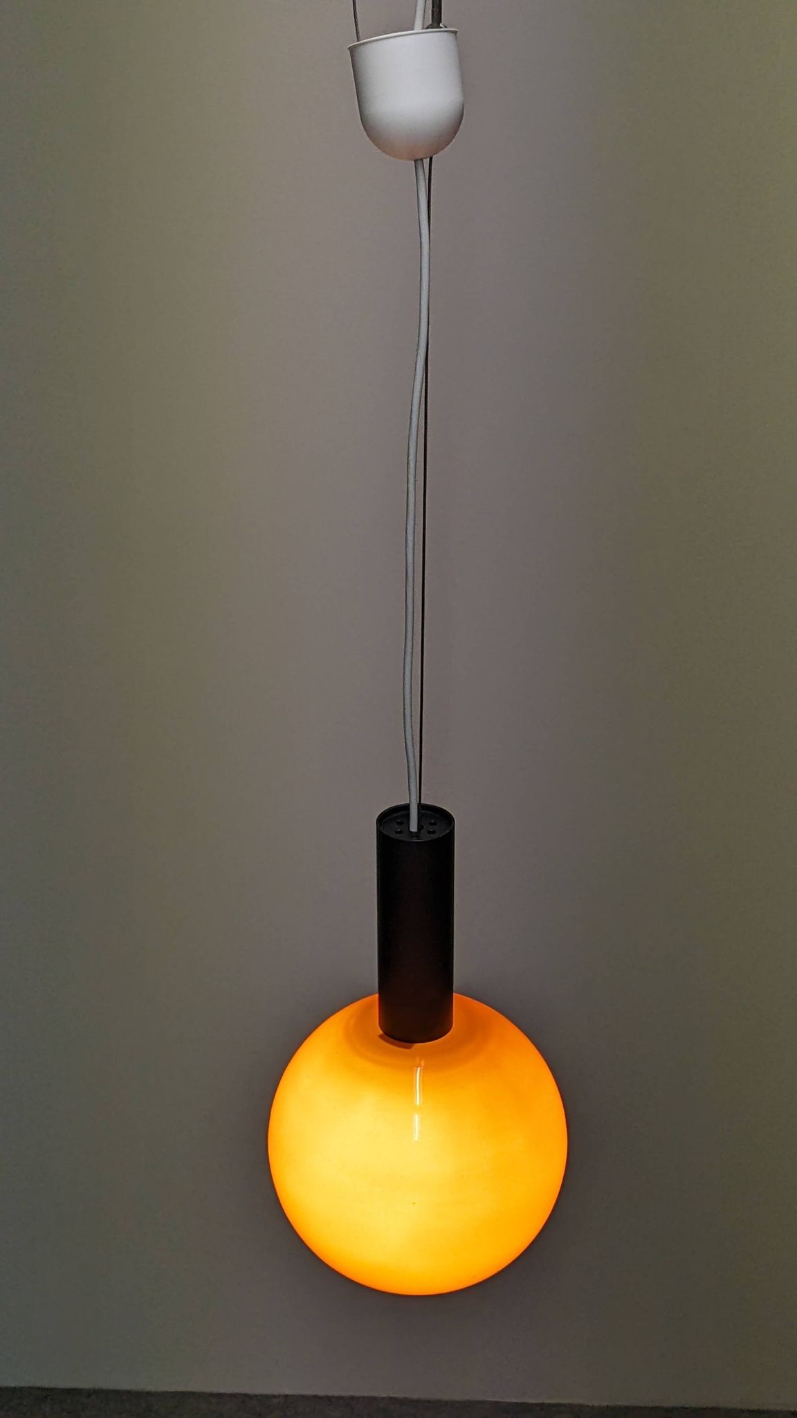 Orange opaline ball pendant by Parscot, France circa 1970.