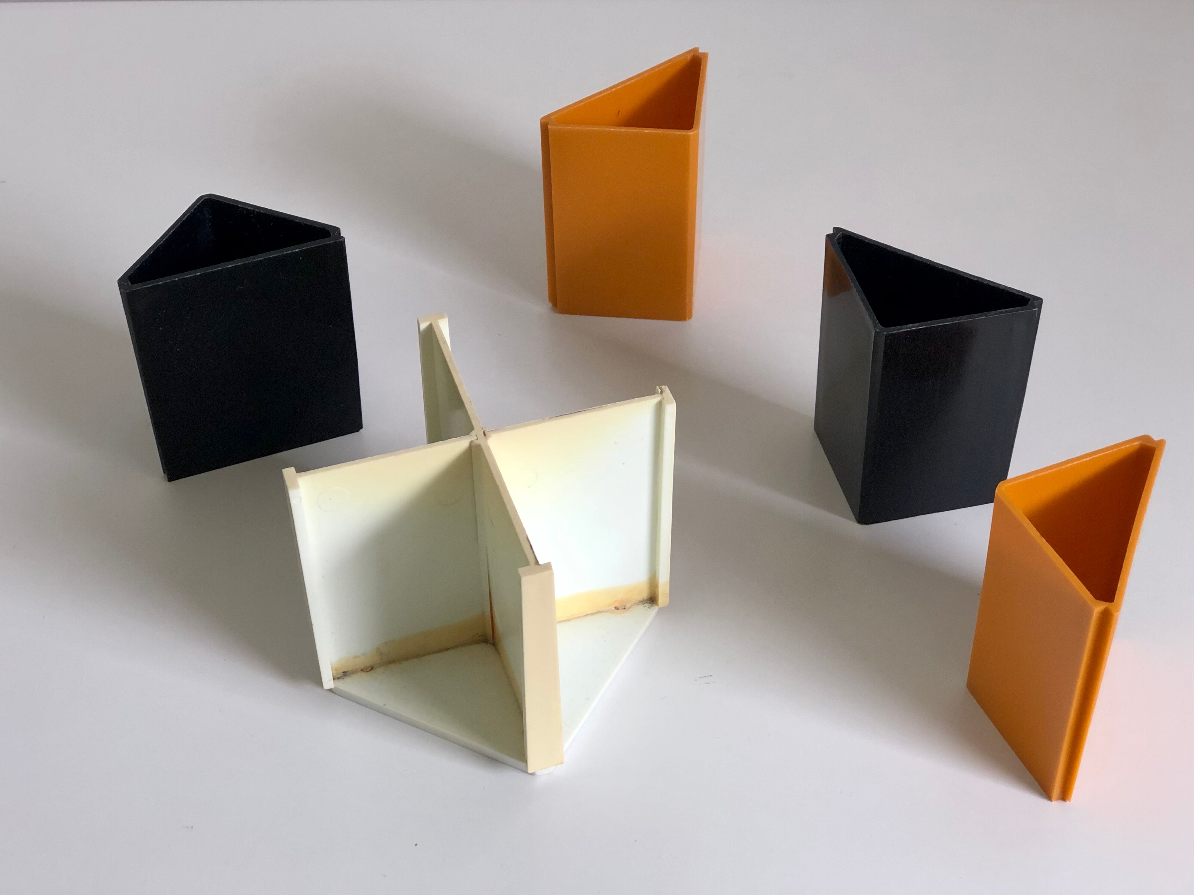 Black and orange plastic compartment pencil pot, 1970