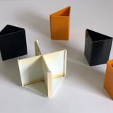 Black and orange plastic compartment pencil pot, 1970