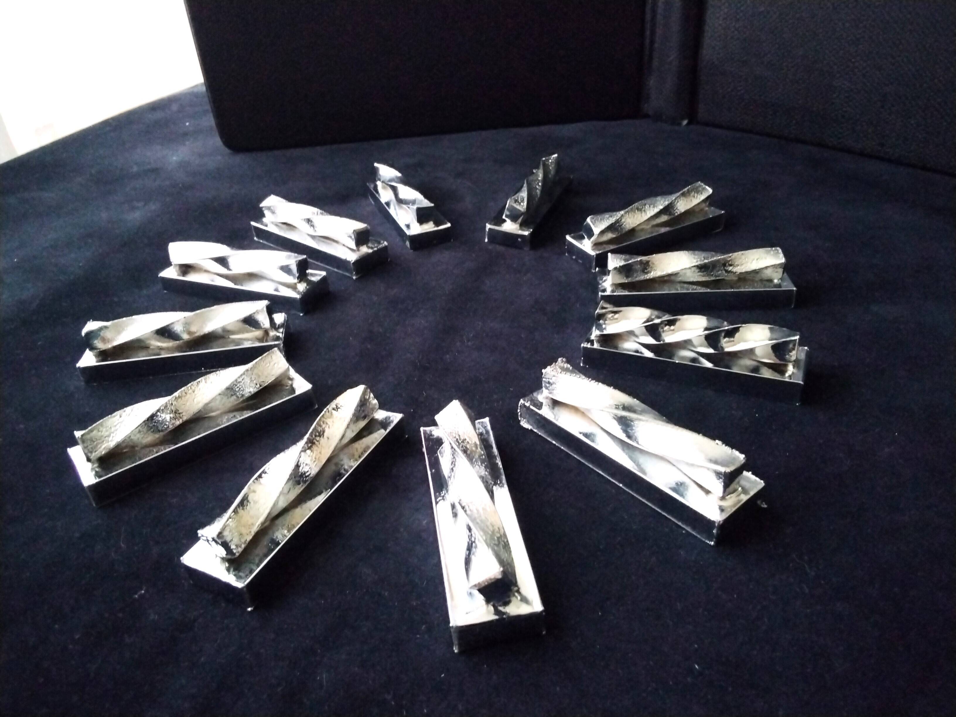 12 silver metal knife holders