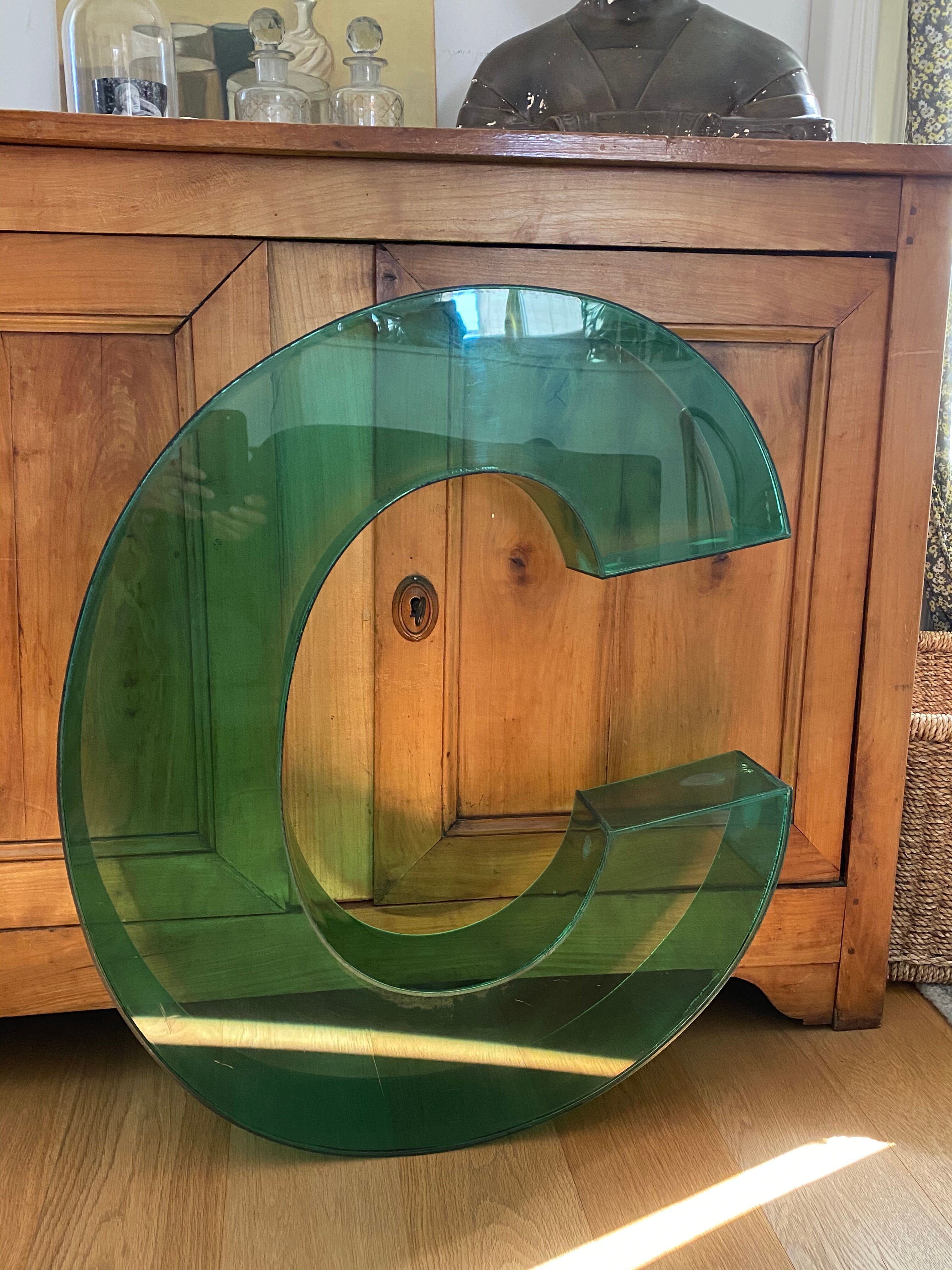 Letter signs C in transparent plexiglass