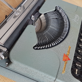 J M Rooy 50s travel writing machine