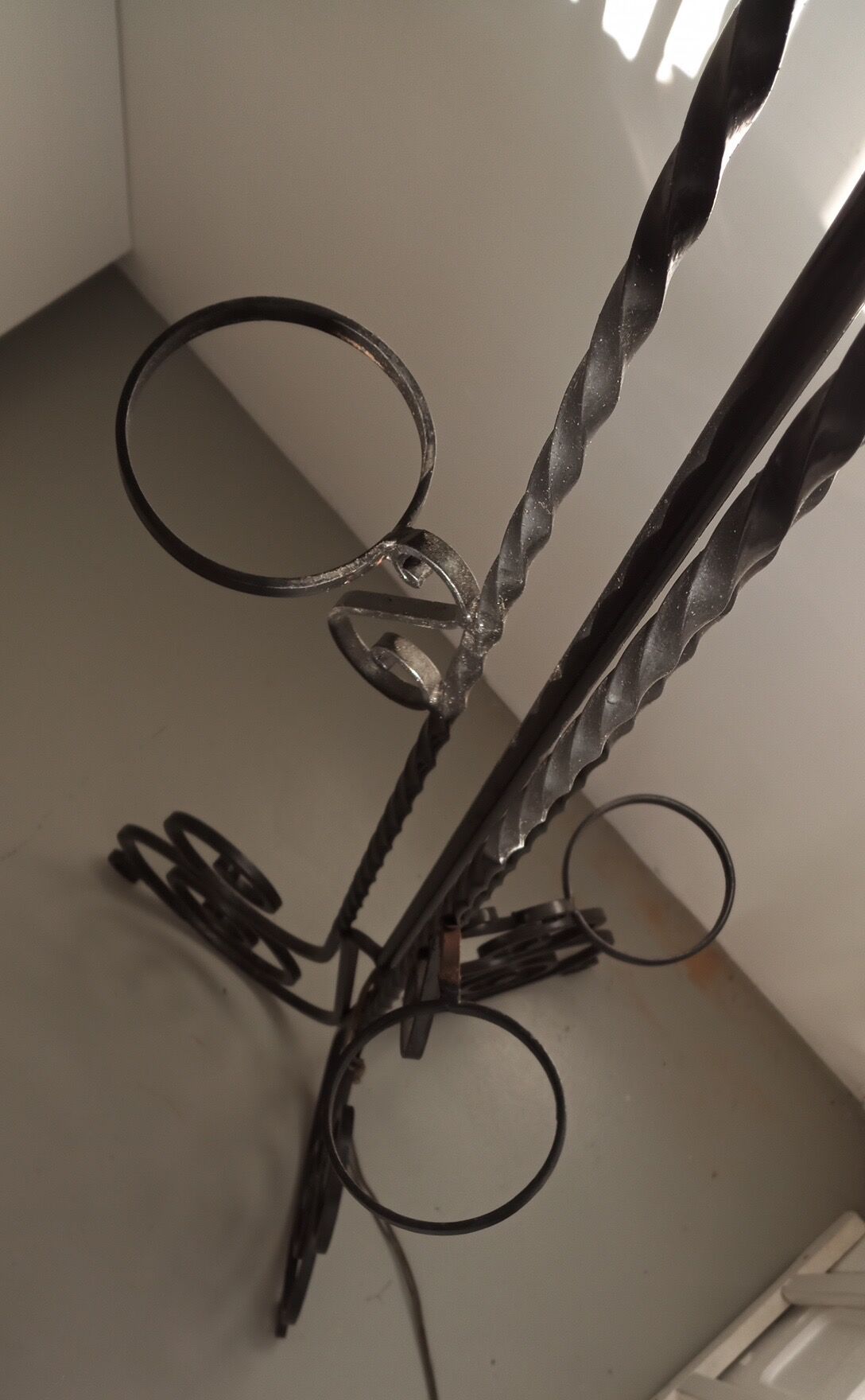 Twisted wrought iron floor lamp with plant holders from the 50s and 60s