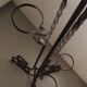 Twisted wrought iron floor lamp with plant holders from the 50s and 60s