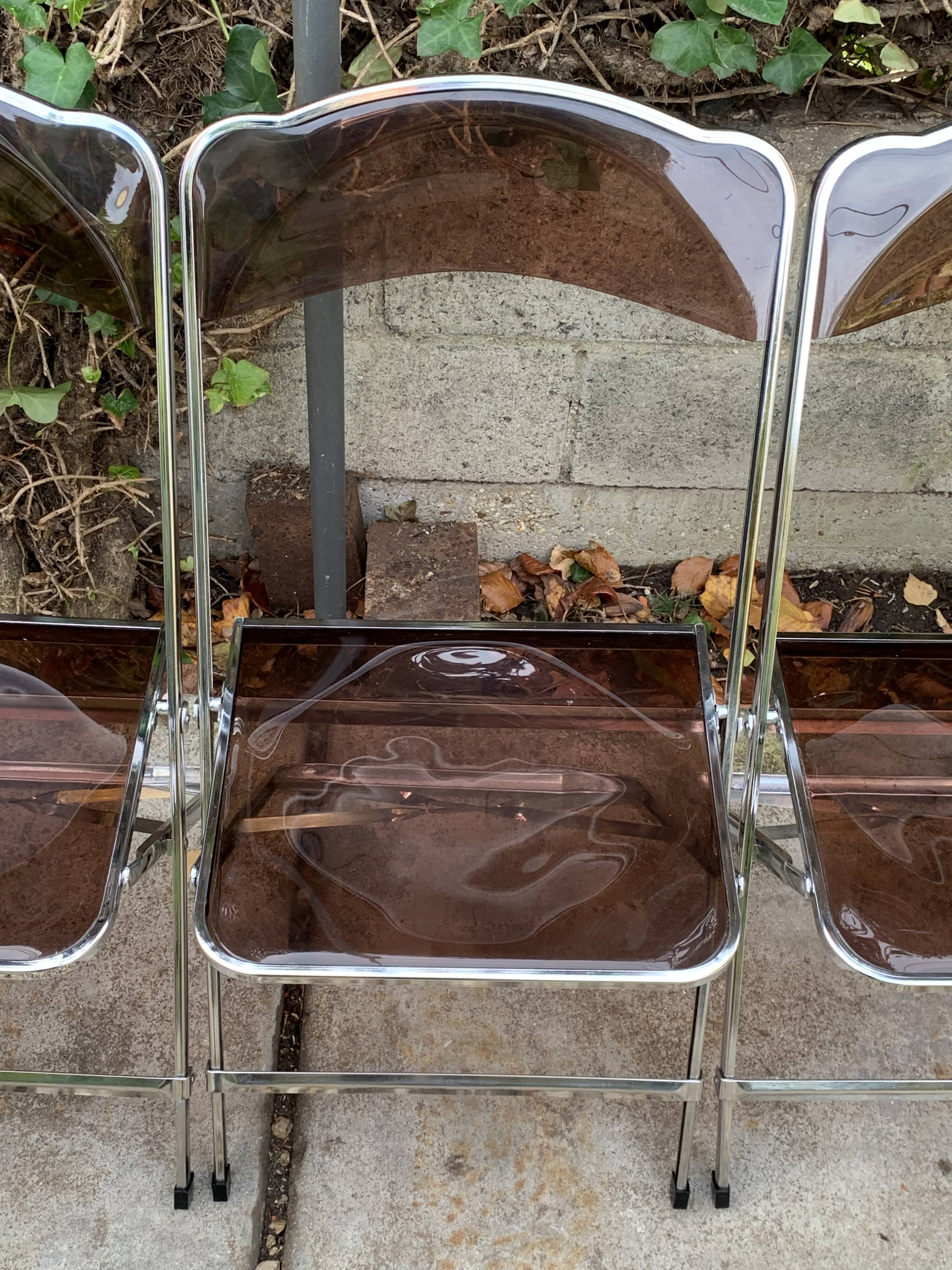 6 chaises pliantes en Plexiglas fumé et métal chrome Chaisor 1970