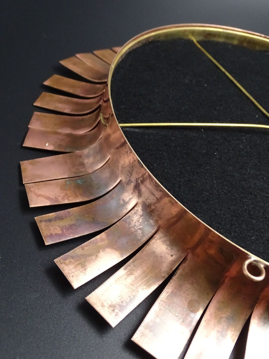 Round mirror in cut copper, sun-shaped  1970