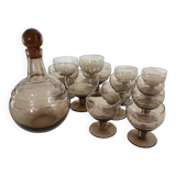 Smoked glass glasses and carafe from the 60s and 70s