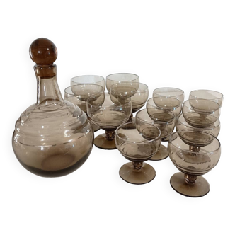 Smoked glass glasses and carafe from the 60s and 70s