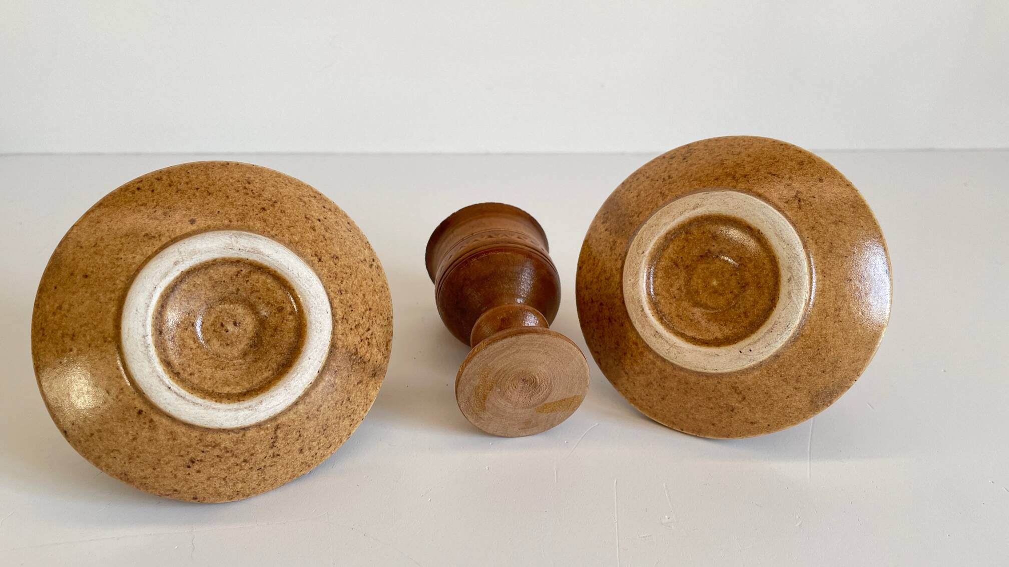 Trio of vintage ceramic and wood egg cups