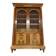 Large Empire-style library in wood with gilded bronze ornaments.