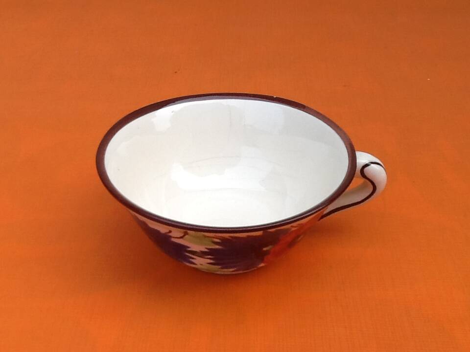 Earthenware Breakfast Cup / Saucer with floral decoration