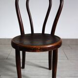 Antique curved wooden children's chair by Fischel, early 20th century.