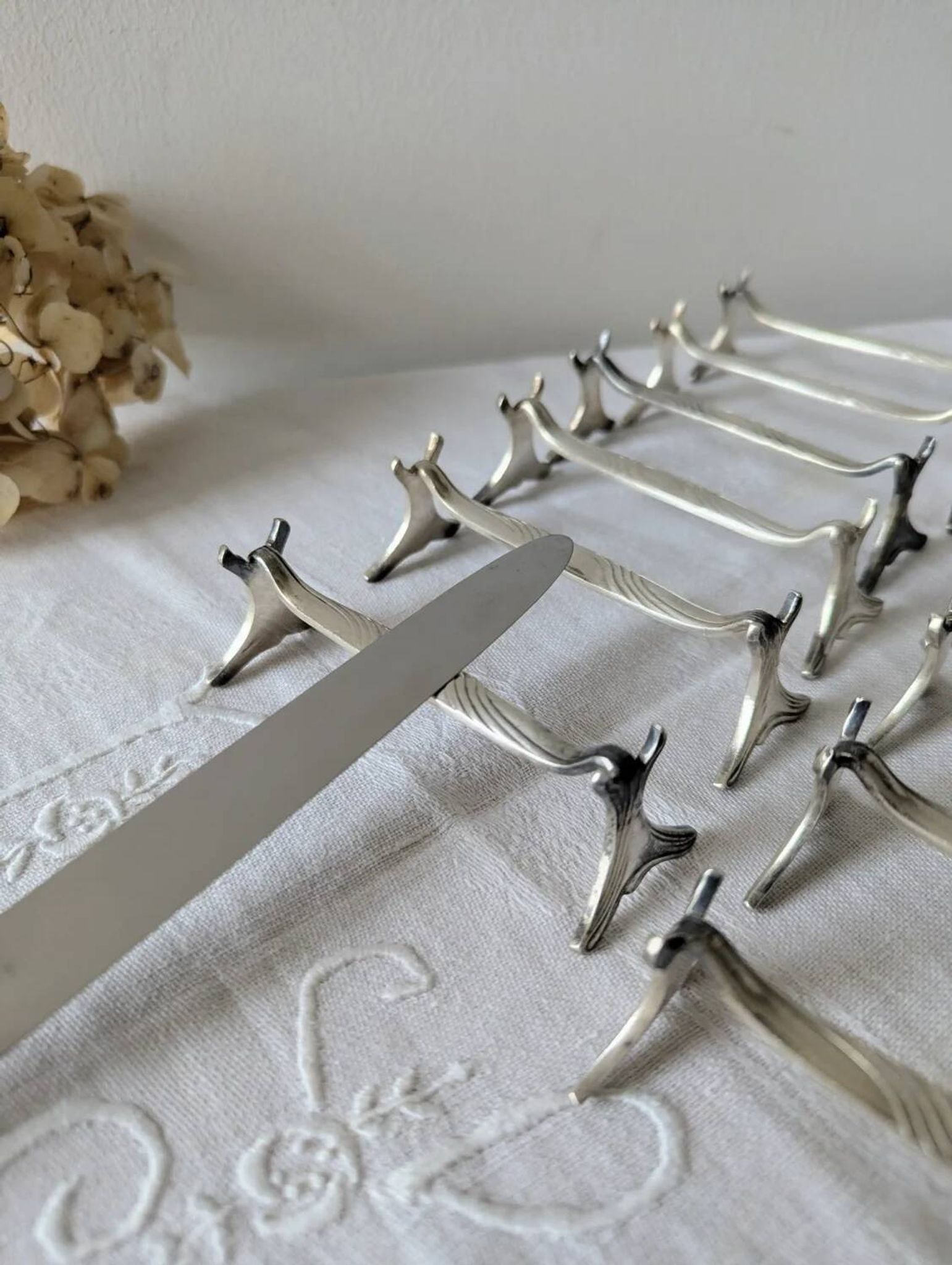 Set of 12 Christofle knife rests, Moderne 1912 model