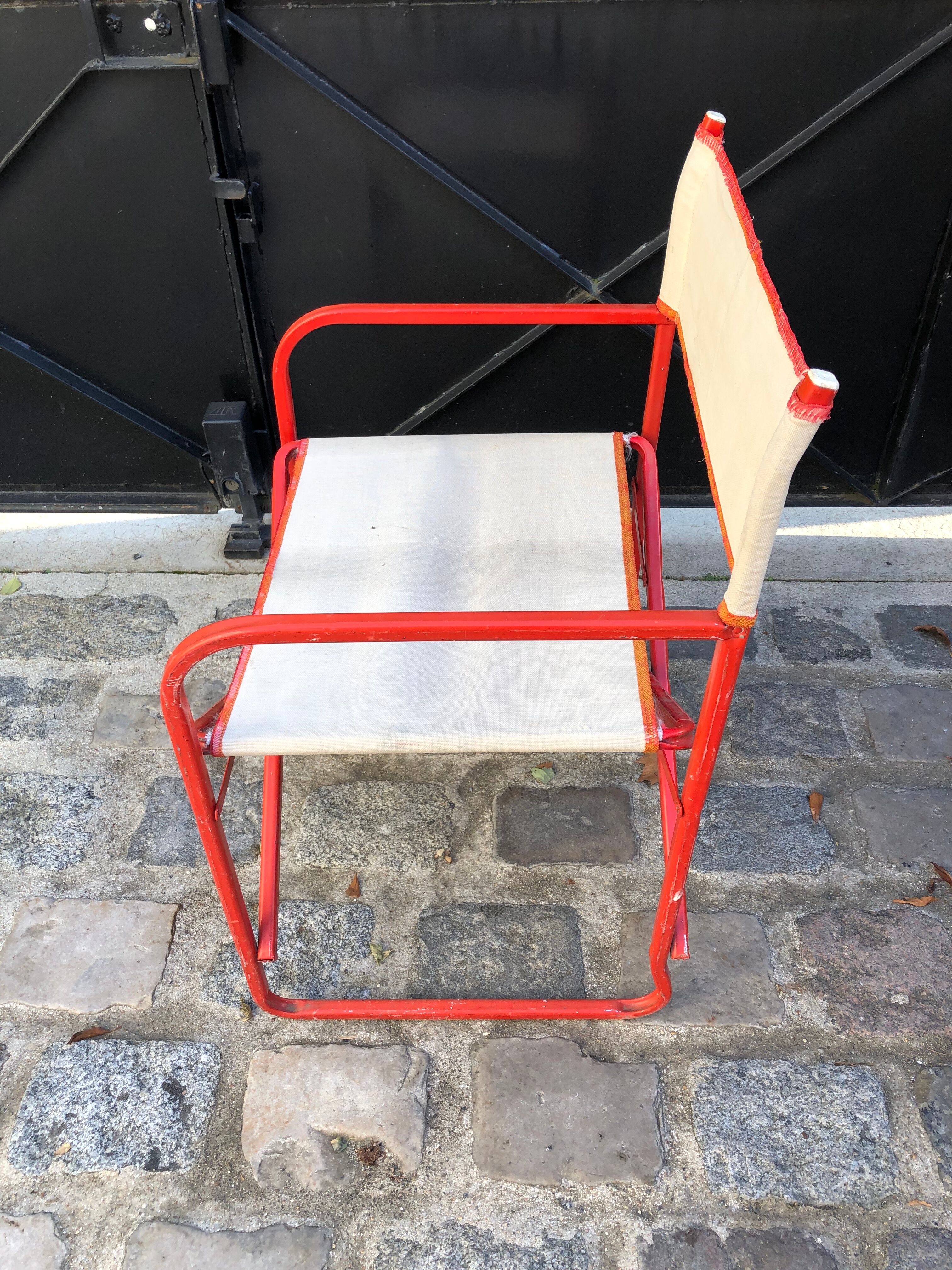 Folding metal armchair