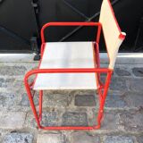 Folding metal armchair