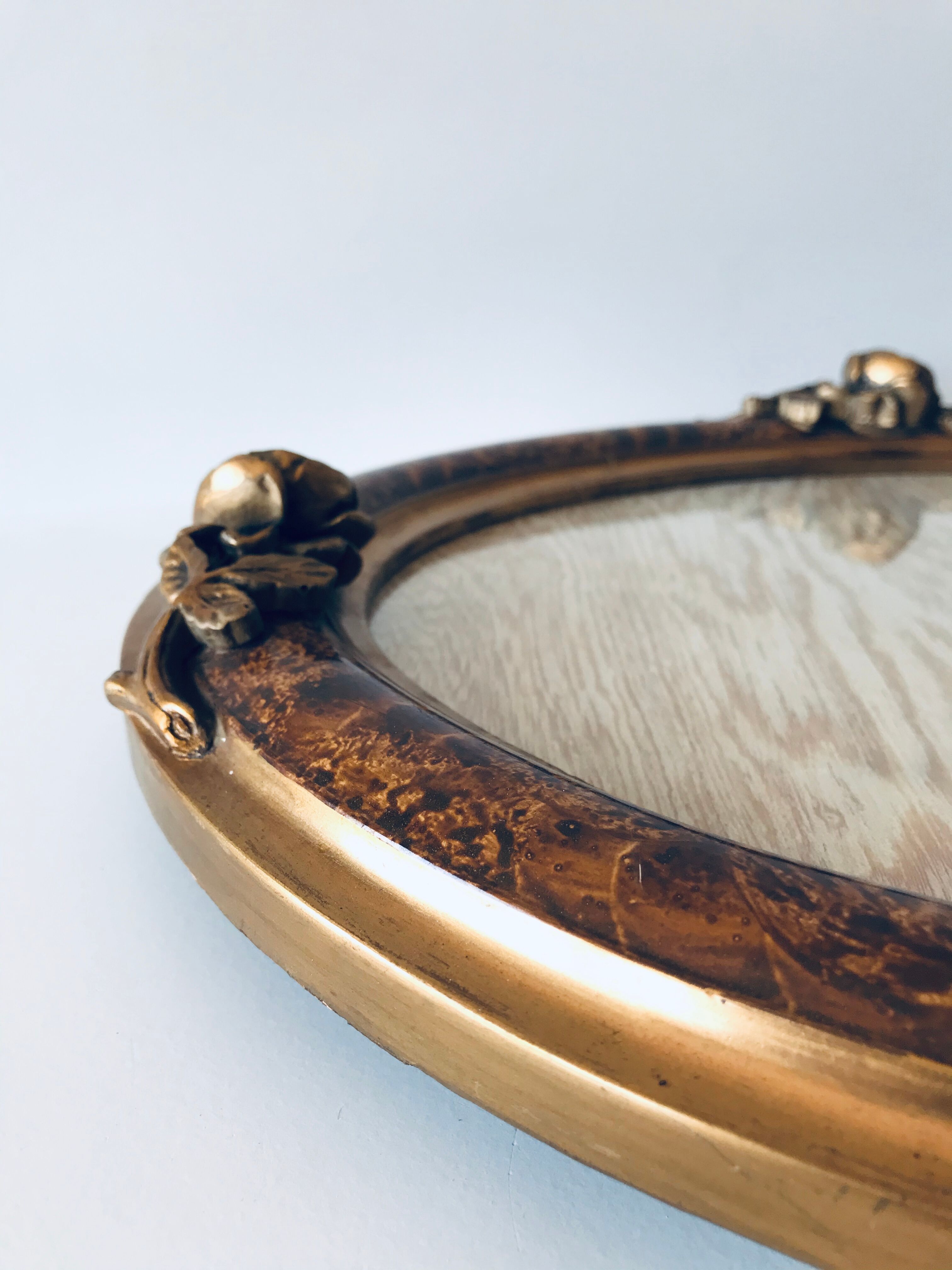 Golden old oval frame