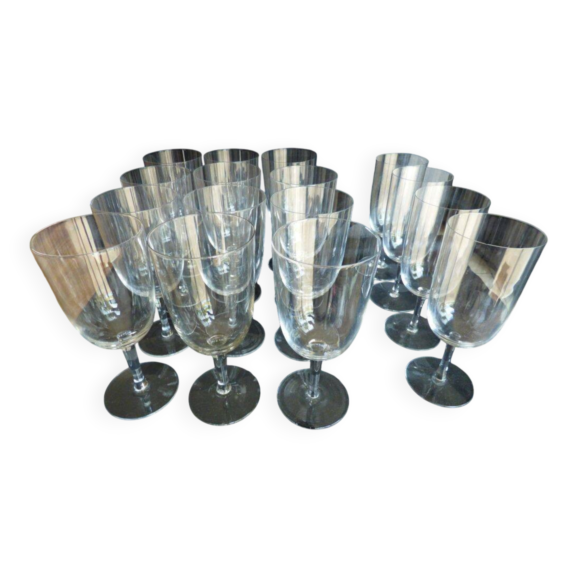 Set of 16 crystal glasses including 12 crystal glasses.