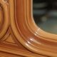 Vintage Art Deco decorative mirror with a thick frame.