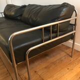 Sofa and armchair in chrome metal and black leather