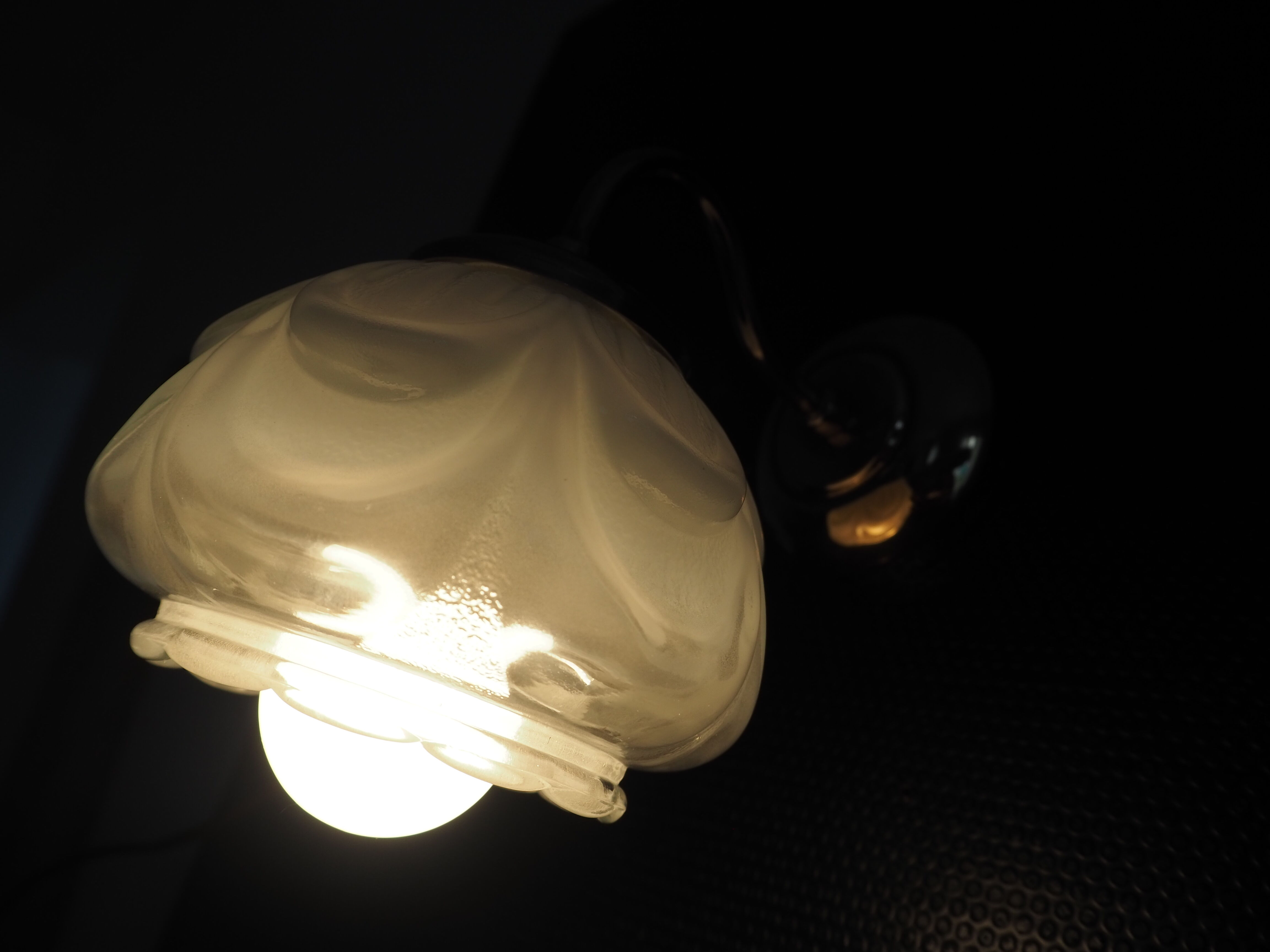 Brass wall lamp and white glass globe from the 1950s-1960s.