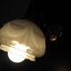 Brass wall lamp and white glass globe from the 1950s-1960s.