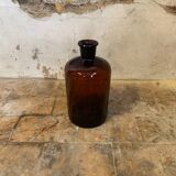 Ancienne bouteille d’apothicaire en verre ambré