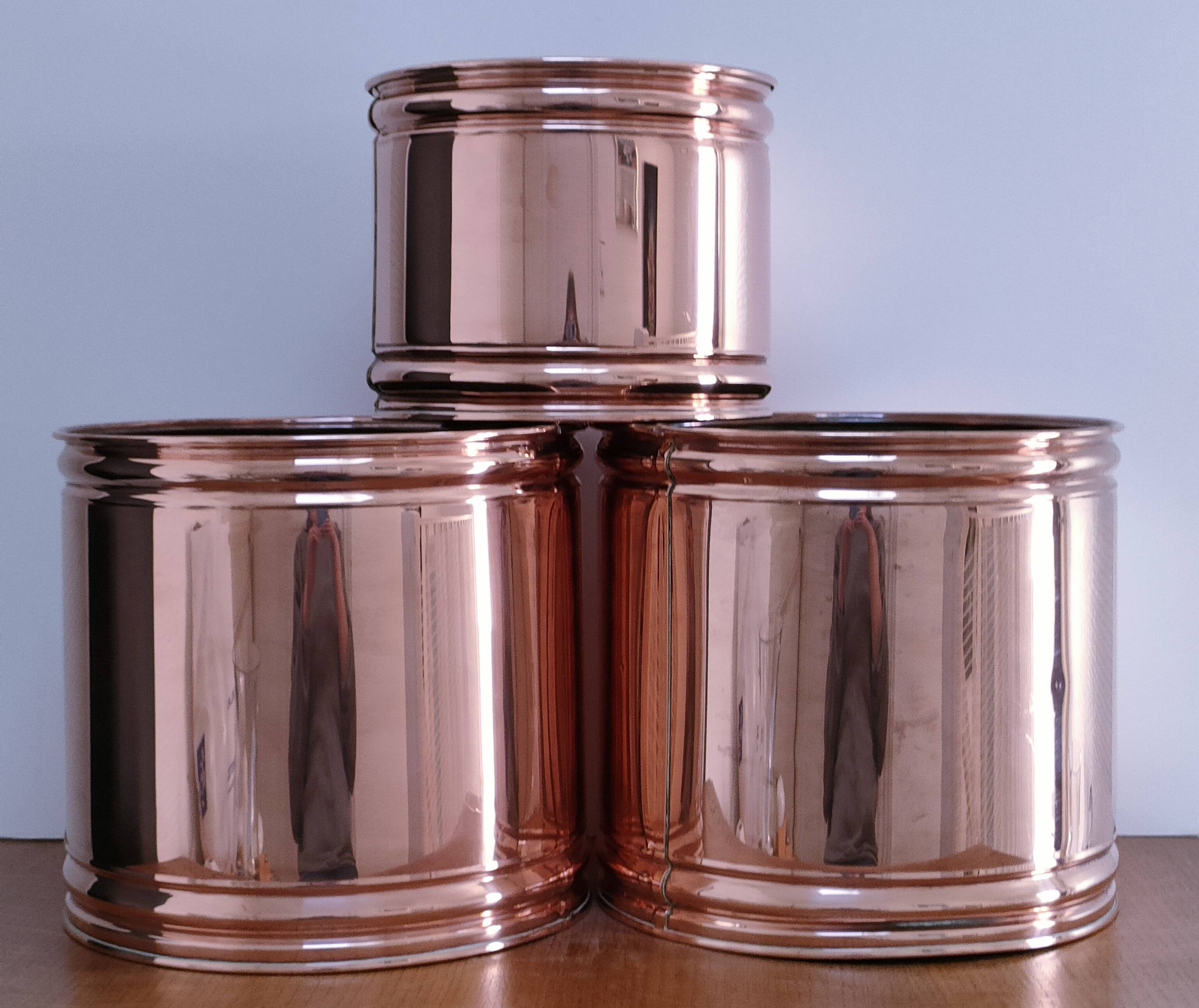 three cylindrical plant pots in a Scandinavian design from the 80s