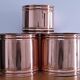 three cylindrical plant pots in a Scandinavian design from the 80s