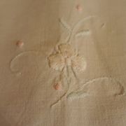 White tablecloth embroidered with lace & days